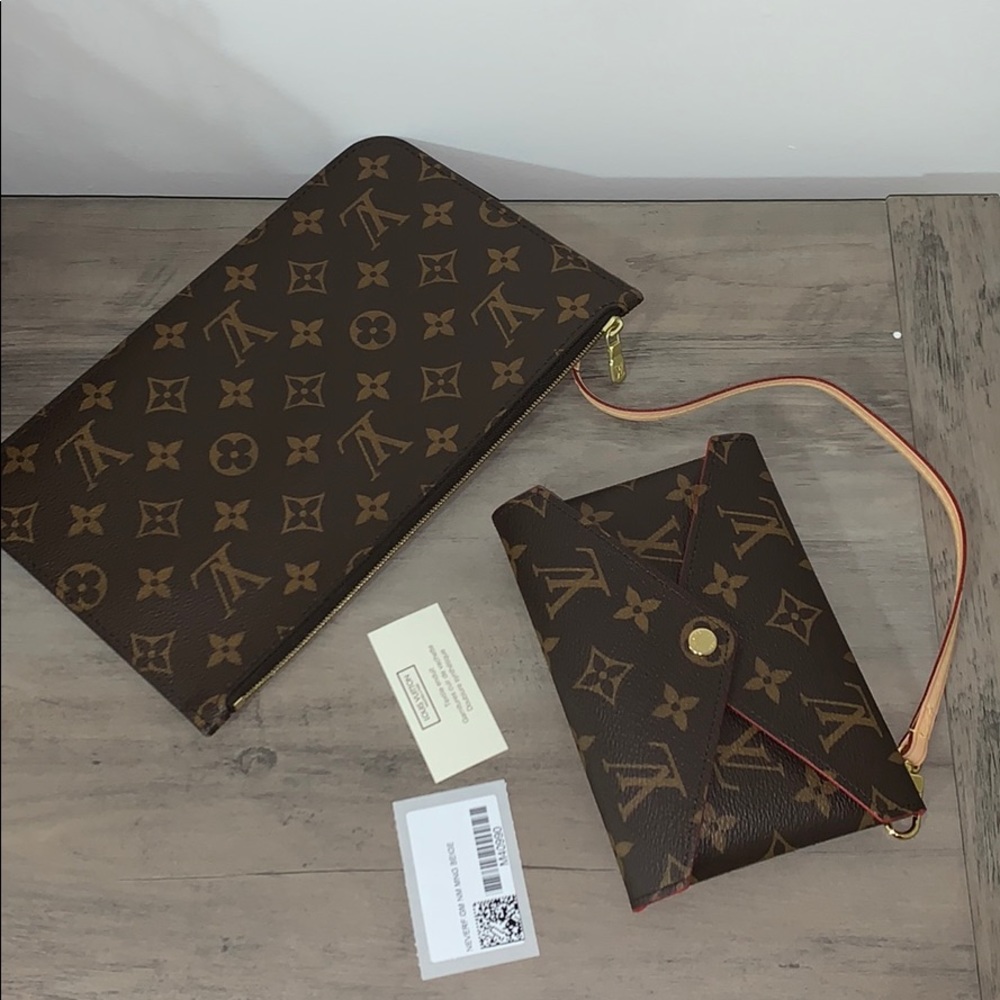 Like new. Neverful MM/GM Clutch and M karigami bag